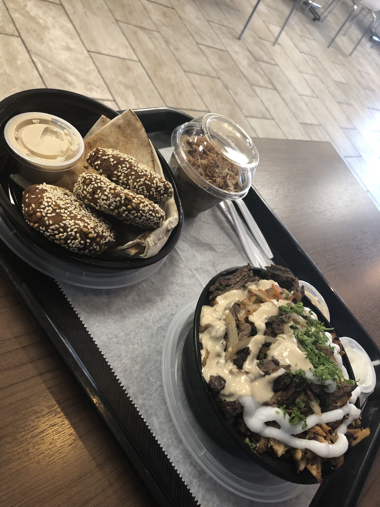 Falafel (top left) with the chicken and beef shawarma.